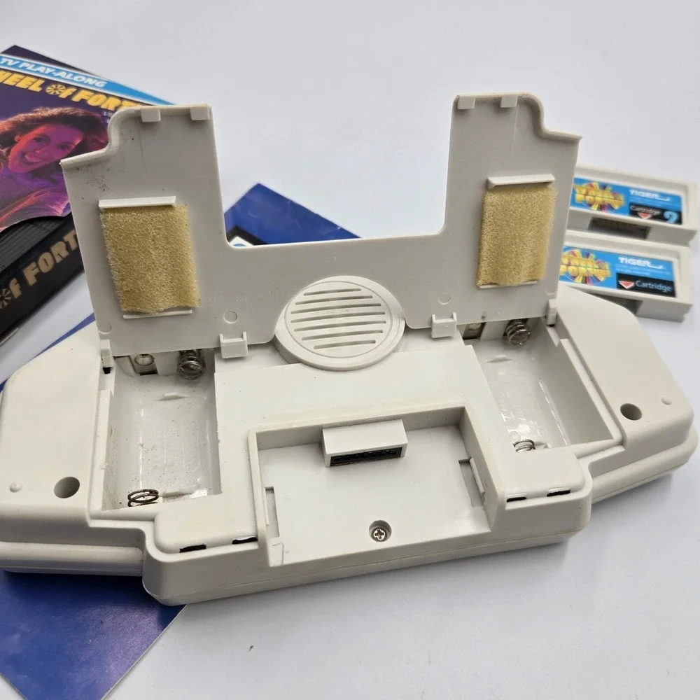 1995 Tiger Hand Held Electronic Wheel Of Fortune Expansion Cartridges Book & VHS